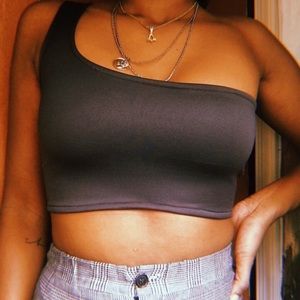 Elements the label asymmetrical crop tops.